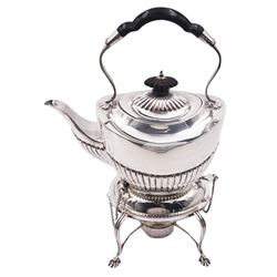 Late Victorian silver spirit kettle on stand, the teapot of oval part fluted form with ebonised finial and part ebonised carry handle, upon a silver stand of oval form upon four curved and stylised pad feet, with removable silver burner, hallmarked James Deakin & Sons, Sheffield 1900, approximate gross weight 22.36 ozt (695.4 grams)