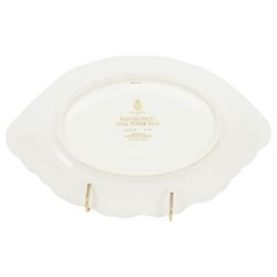 Late 20th century Royal Worcester dish, of oval form with gilt shaped rim and twin shell handles, hand painted by Jason Bowman with still life of fruit upon mossy ground, signed J Bowman, wit marks beneath, with makers fitted card box


