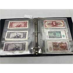 World banknotes, including Queen Elizabeth II The States of Jersey one pound 'DB202703', five pounds 'BB527762' and ten pounds 'AB651481', reserve bank of New Zealand two dollars '1L3 741894', King George V Straits Settlements one dollar 1st January 1935 'F/83 28924', various Bank of England notes etc, housed in two ring binder albums