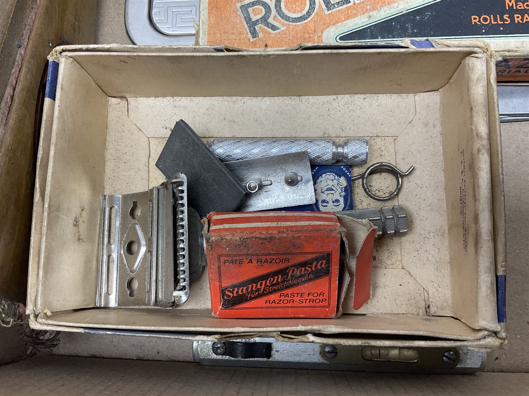 Collection of various razors and smoking items to include Ronson brass table lighter, Rolls Razor, Seigneur case with lighter, etc