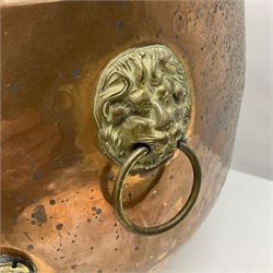 Large copper jardiniere, with twin brass lion mask handles and three paw feet, H35.5cm