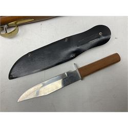 Reproduction non-firing flintlock pistol with brass skull crusher butt, the lock-plate inscribed 'Tower' and 'GR' L40cm; Sabre Japan Original Bowie Knife in sheath; and Indian embossed nickel two-piece walking cane (3)