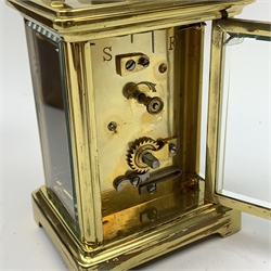 A brass cased carriage clock, the white enamel dial with black Roman numerals, marked Pearch & Sons Leeds, York & Leicester, including handle H14cm, in fitted case. 