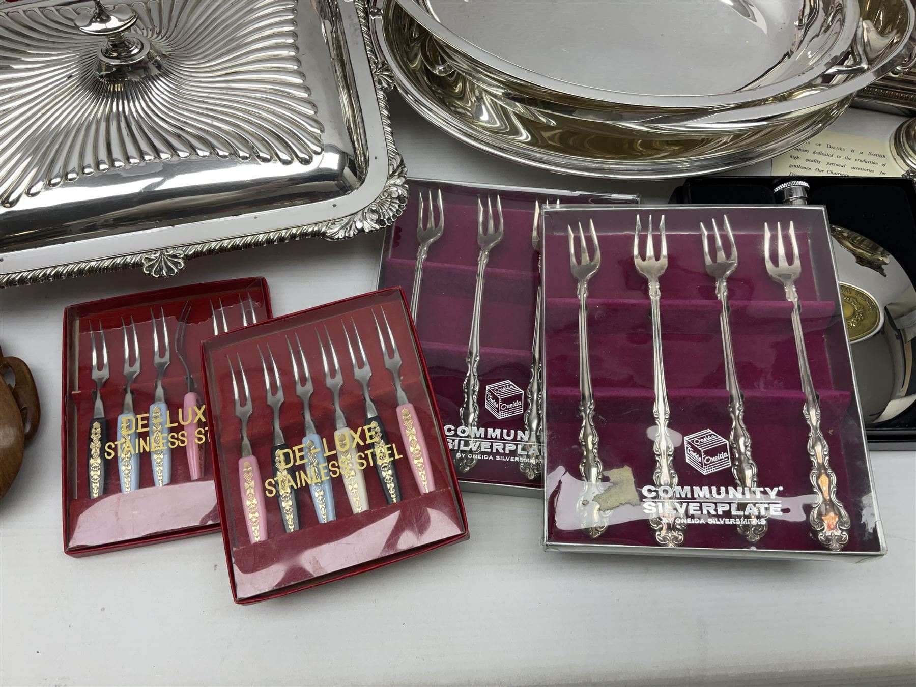 Silver plated Calibri lighter, in the form of a twin handled vase with mask handles, together with a pair of silver plated candle sticks, horn handled carving set with hallmarked silver ferrules and other silver plated items