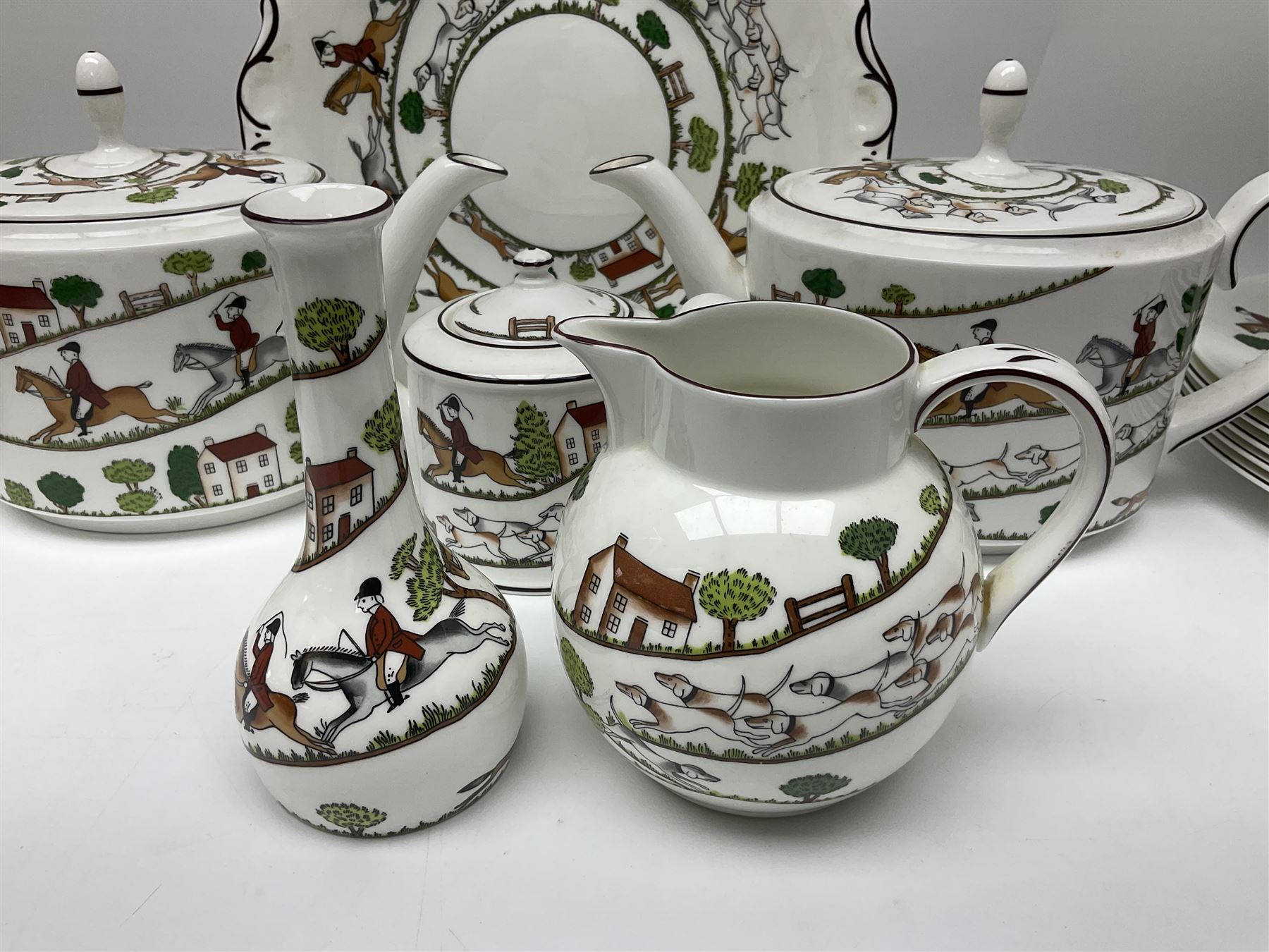 Wedgwood Hunting Scenes dinner and tea service for ten, to include dinner plates, side plates, dessert plates, cups and saucers, mugs, two large teapots, two milk jugs, etc, together with matching items by coalport and Staffordshire (94)