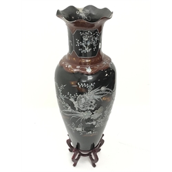 A Japanese lacquered composite floor vase with mother-of-pearl decoration, H99cm and floor standing bronze finish figural lamp on a large cylindrical oriental style plinth. (3).