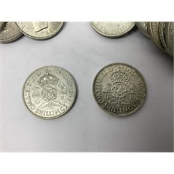 Twenty-eight King George VI pre 1947 silver two shilling coins, dated ten 1945 and eighteen 1946, approximately 310 grams