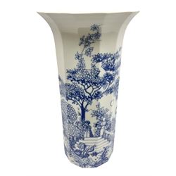 Rosenthal Germany Studio-Linie floor vase of canted cylindrical form with flared rim, decorated in blue with figures in a garden scene on white ground, designed by  Bjorn Wiinblad, with printed mark beneath, H55cm