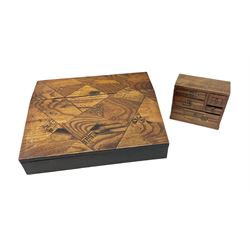 Early 20th century Japanese writing slope, the exterior cover with geometric parquetry, opening to reveal a lacquered fitted interior, H10cm L37cm D30cm, together with a small table top set of drawers with similar decoration, H13cm L15cm D7cm