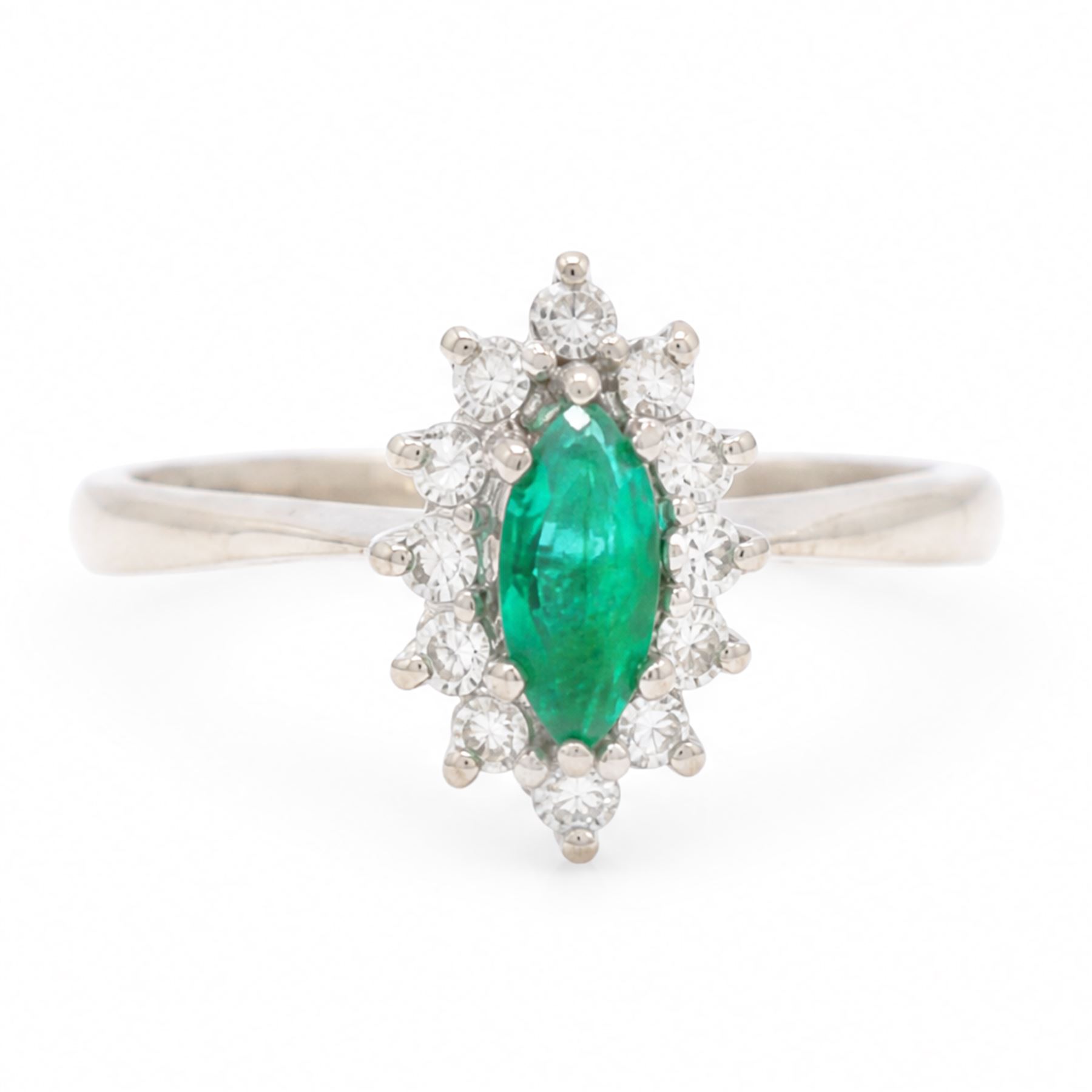 18ct white gold emerald and diamond cluster ring, single marquise cut emerald 0.25 carat, surrounded by twelve round brilliant cut diamonds, London 1979, total diamond weight approx 0.25 carat