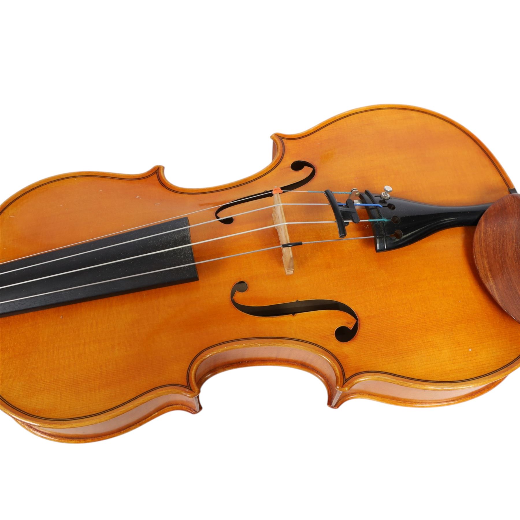 Late 20th century German full size viola, labelled to interior 'Walter Muller Bad Brambach 1976 made in GDR' with two-piece back, ebonised finger board, tuning pegs and tail piece, with a carved scroll and two bows, in hard fitted case, back length 16 inches