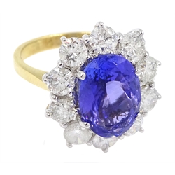 18ct gold oval tanzanite and diamond cluster ring, hallmarked, tanzanite approxx 4.10 carat, diamond total weight approx 2.20 carat