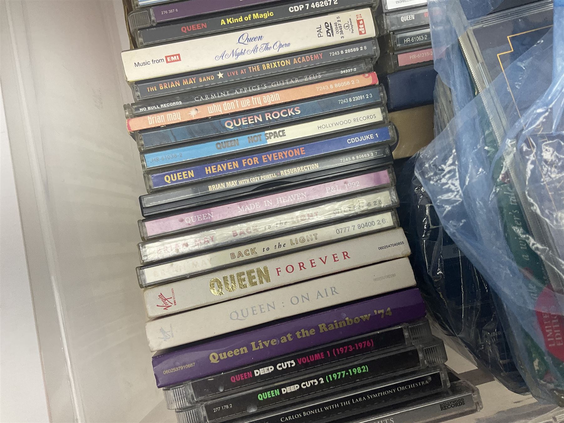 Large collection of VHS tapes, DVDS, CDs to include Queen, James Bond 007, Batman etc, in three boxes