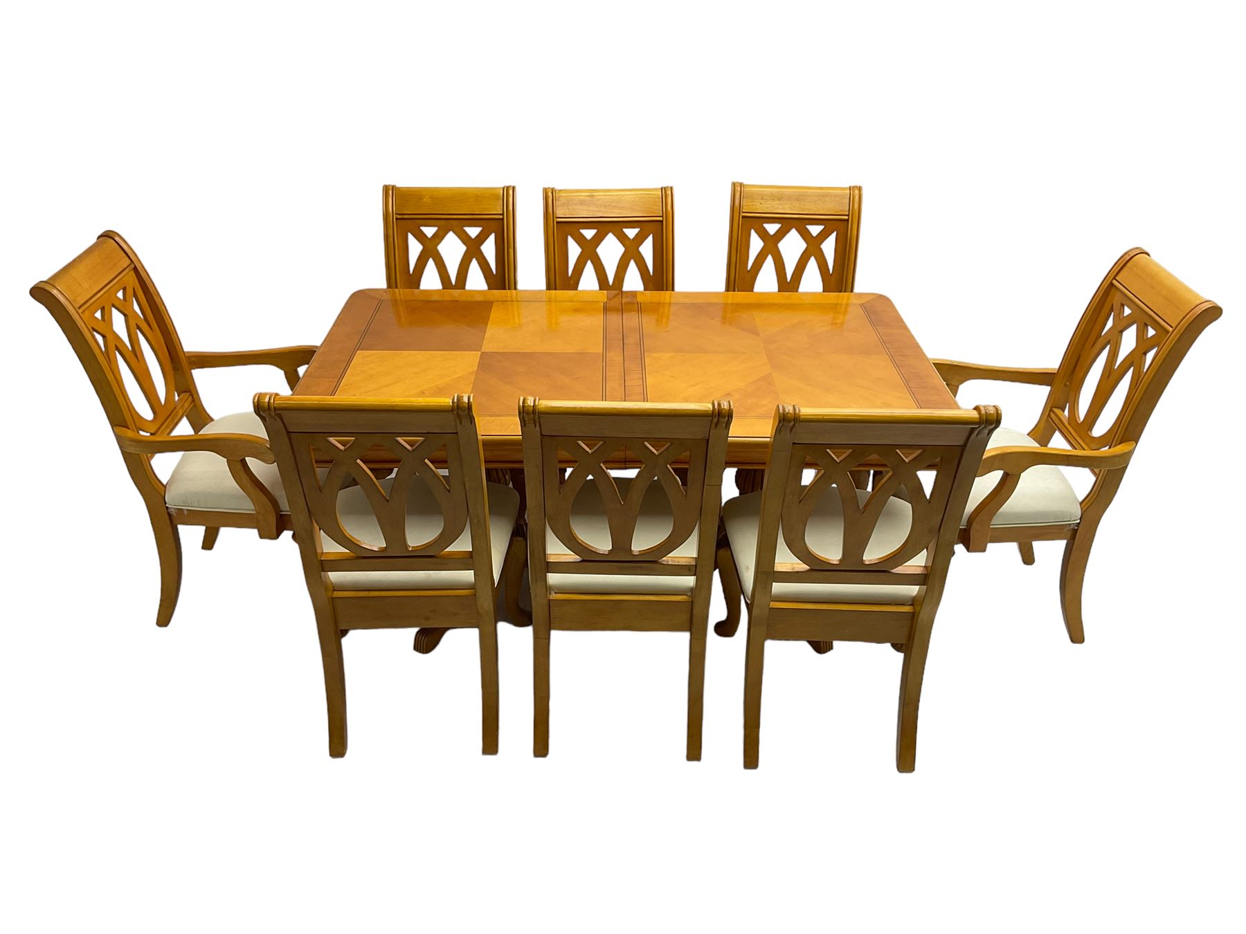 Yew wood extending twin pedestal dining table, rectangular top with ebony stringing over turned and reeded vasiform pedestals on tripod bases, with two additional leaves (W159cm D92cm); and set of eight (6+2) matching dining chairs, high pierced backs over seats upholstered in ivory fabric, on cabriole supports (W57cm H101cm)