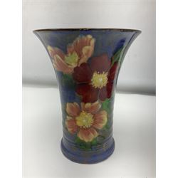 Royal Doulton Wild Rose pattern vase of flared form, painted with flowers on mottled blue ground, together with a matching footed bowl and shallow bowl, pattern no. D6227, c 1940, all with printed marks beneath, largest bowl D27cm (3)