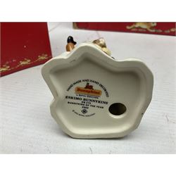 Royal Doulton The Mickey Mouse Collection Pluto figure, Coalport Characters The Snowman Dressing Up figure, three Royal Doulton Bunnykins figures comprising Policeman, Morris Danger and Eskimo, and display stand, Royal Doulton John Beswick Tiggy Winkle, Royal Albert Beatrix Potter Peter Postbag and three Goebel Hummel figures, all boxed