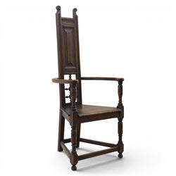 Manner of Liberty & Co. - Arts & Crafts oak Shakespeare chair, high back over triangular s...