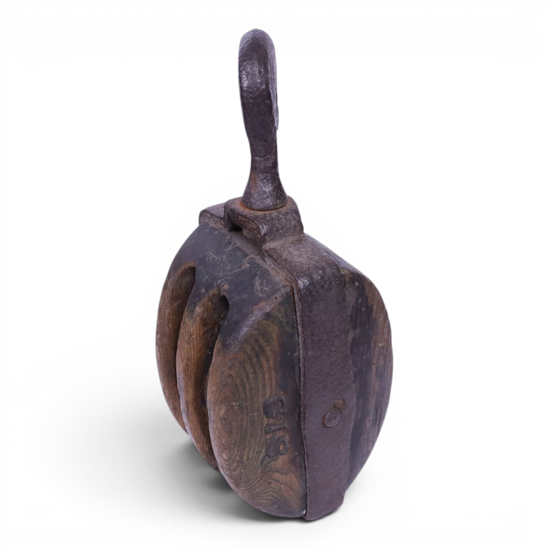 19th century double-sheave wooden pulley block in a metal casing, fitted with an iron hook, stamped GIS to one side, including hook L36cm