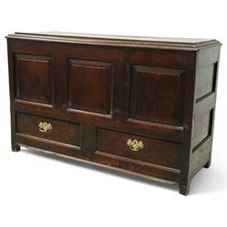 19th century oak coffer, the hinged plank top above a panelled front fitted with two drawers to base, raised on bracket feet