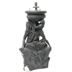 Neoclassical 19th century plaster pedestal, the base cast as two straining Atlantes on a naturalistic rocky base, unmarked, excluding fittings H65cm; together with a set of three plaster figures, cast as Egyptian ladies in headdresses and draped in cloth, by John Dominic Giannelli (1775-1841), the reverse with hieroglyphic decoration, inscribed 'Published as the Act Directed By J D Giannelli 1805', possibly corresponding attachments for the aforementioned pedestal, H62cm 
Provenance: property of a Nobleman