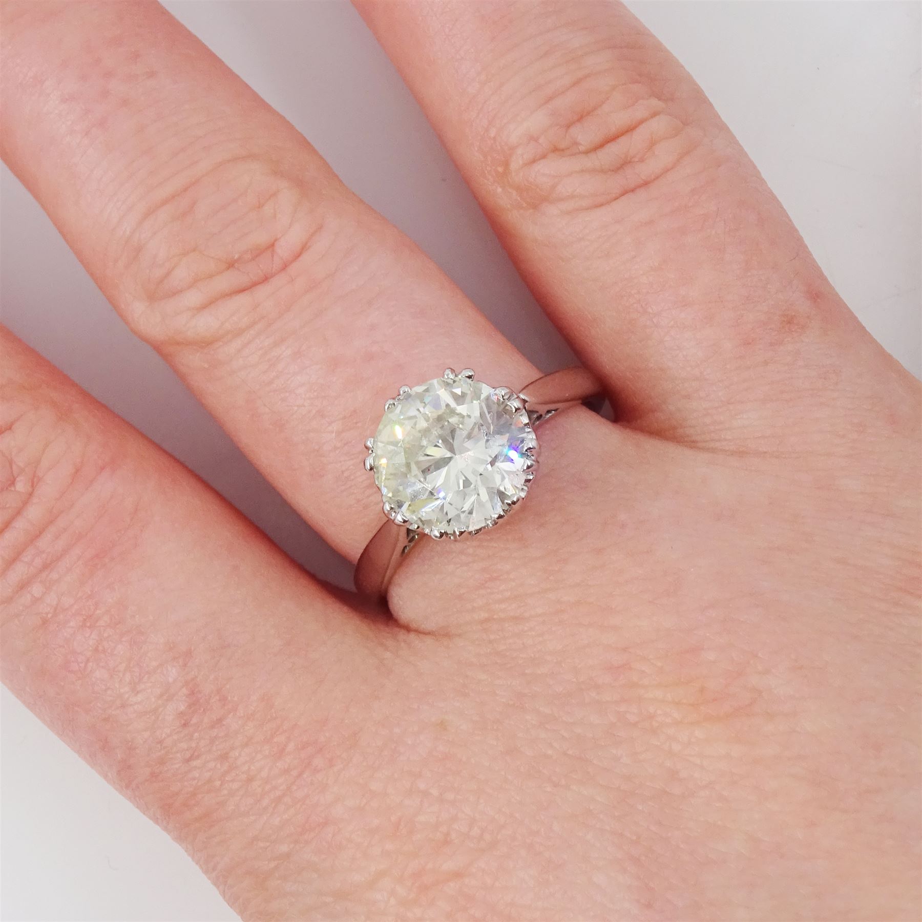 18ct white gold single stone diamond ring, in a fancy heart shaped gallery, hallmarked, diamond 3.07 carat