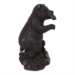 Bronze bear, upon a naturalistic base, with a fish in mouth, H17cm