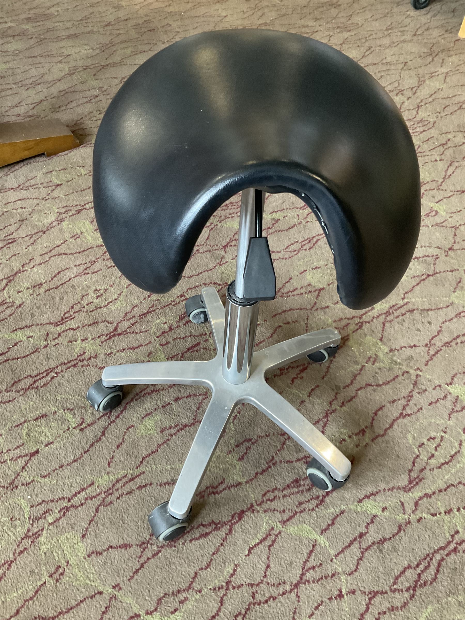 Set of three plastic and a pair of wooden baby high chairs with additional saddle stools (9)- LOT SUBJECT TO VAT ON THE HAMMER PRICE - To be collected by appointment from The Ambassador Hotel, 36-38 Esplanade, Scarborough YO11 2AY. ALL GOODS MUST BE REMOVED BY WEDNESDAY 15TH JUNE.