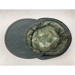 WWII German M43 field cap with 'SS' cloth badge and mountain trooper's edelweiss metal badge