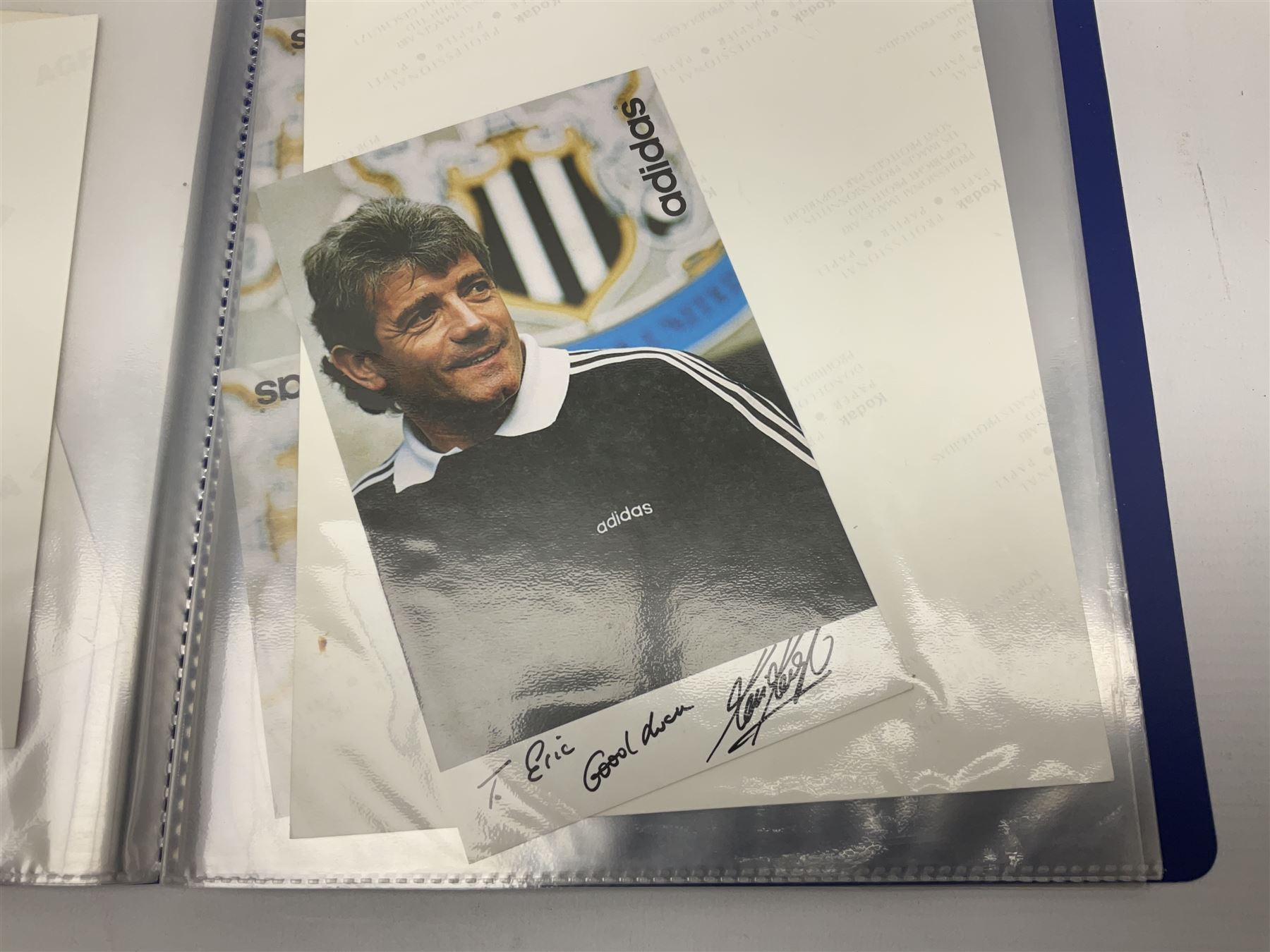 Two folders of over fifty photographs, cards, compliment slips etc of actors, actresses, celebrities, politicians, sports personalities etc, all bearing signatures, including David Frost, Lloyd Grosman, John Suchet, Julia Somerville and othe GMTV presenters, Carol Vorderman, Jackie Collins, Rolf Harris, Timothy Dalton, Pete Postlethwaite, Magnus magnusson, John Major, Kate Moss, Uri Geller, David Beckham, Peter Alliss, Sharon Davies, Kevin Keegan etc