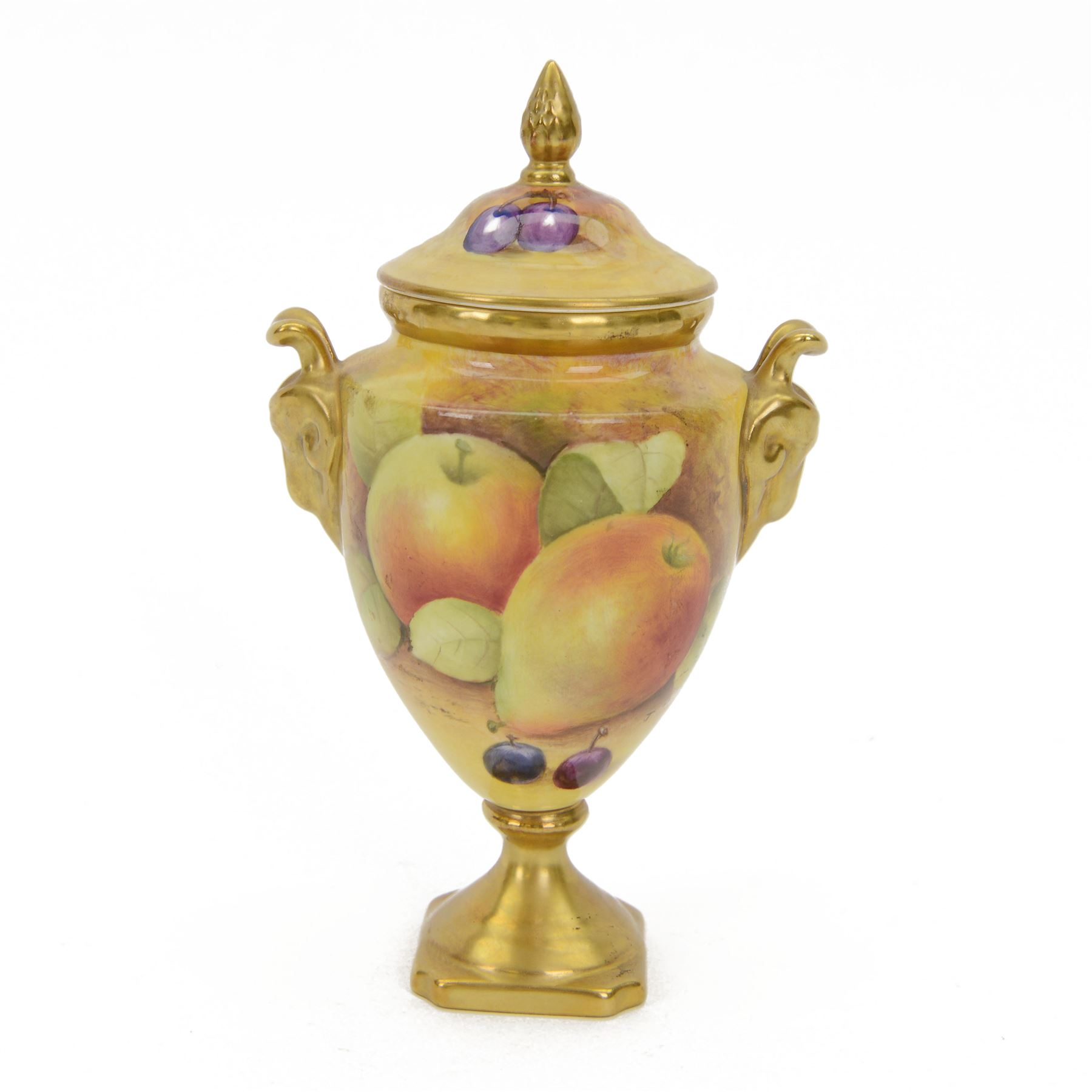Coalport pedestal vase and cover, of urn form hand painted with fruit with gilt detail, signed J Mottram, H18cm