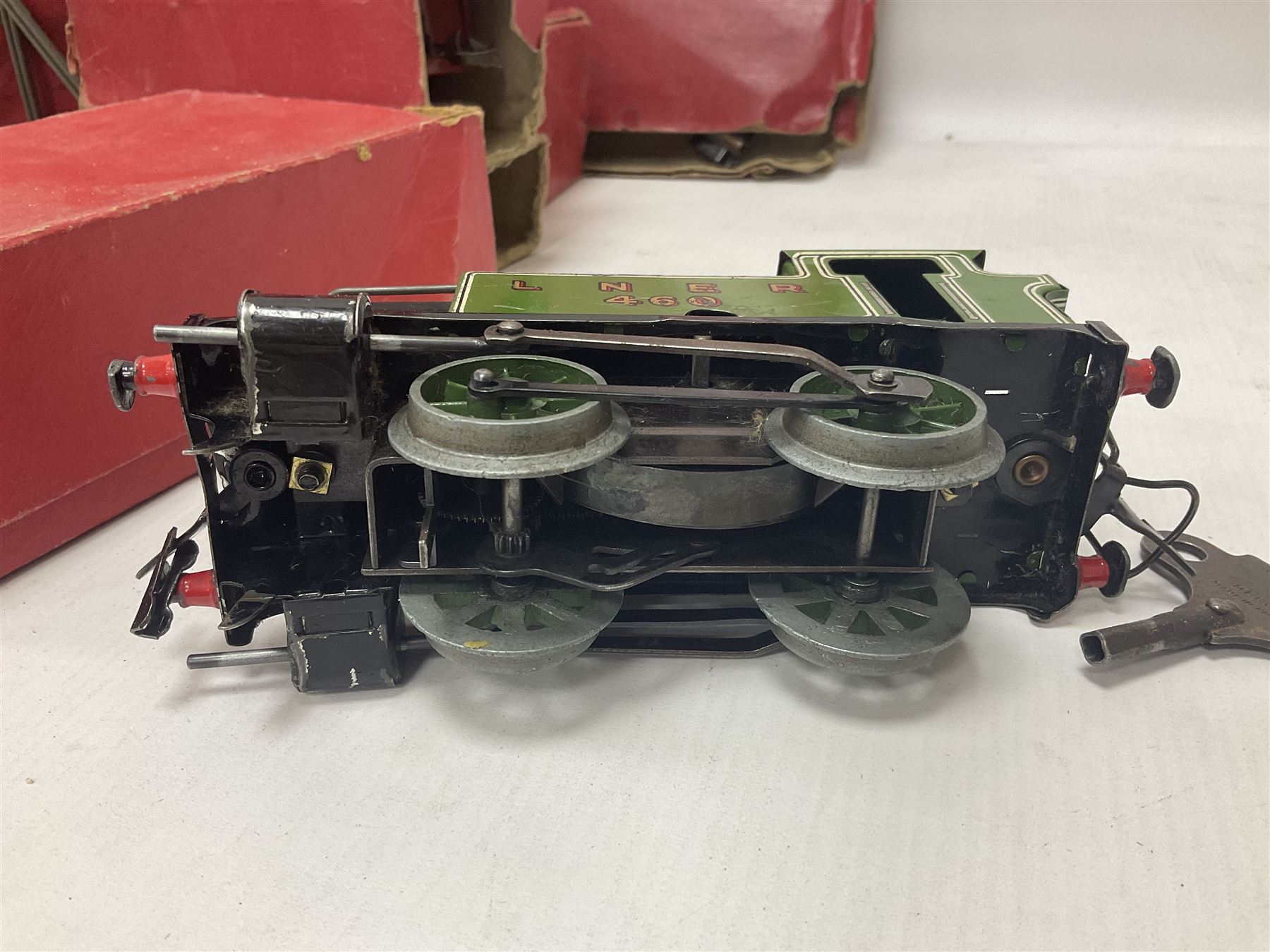 Hornby ‘0’ gauge - LNER 0-4-0 no.460 type 101 locomotive in green with key; further boxed ‘0’ gauge to include no.1 Crane Truck, no.2 single arm signals, open and closed goods wagons and cars; large quantity of track to include railway crossing, straight and curved track etc, in two boxes 