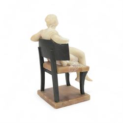 Classical style alabaster figure, modelled as a nude female figure seated upon a chair, H34cm
