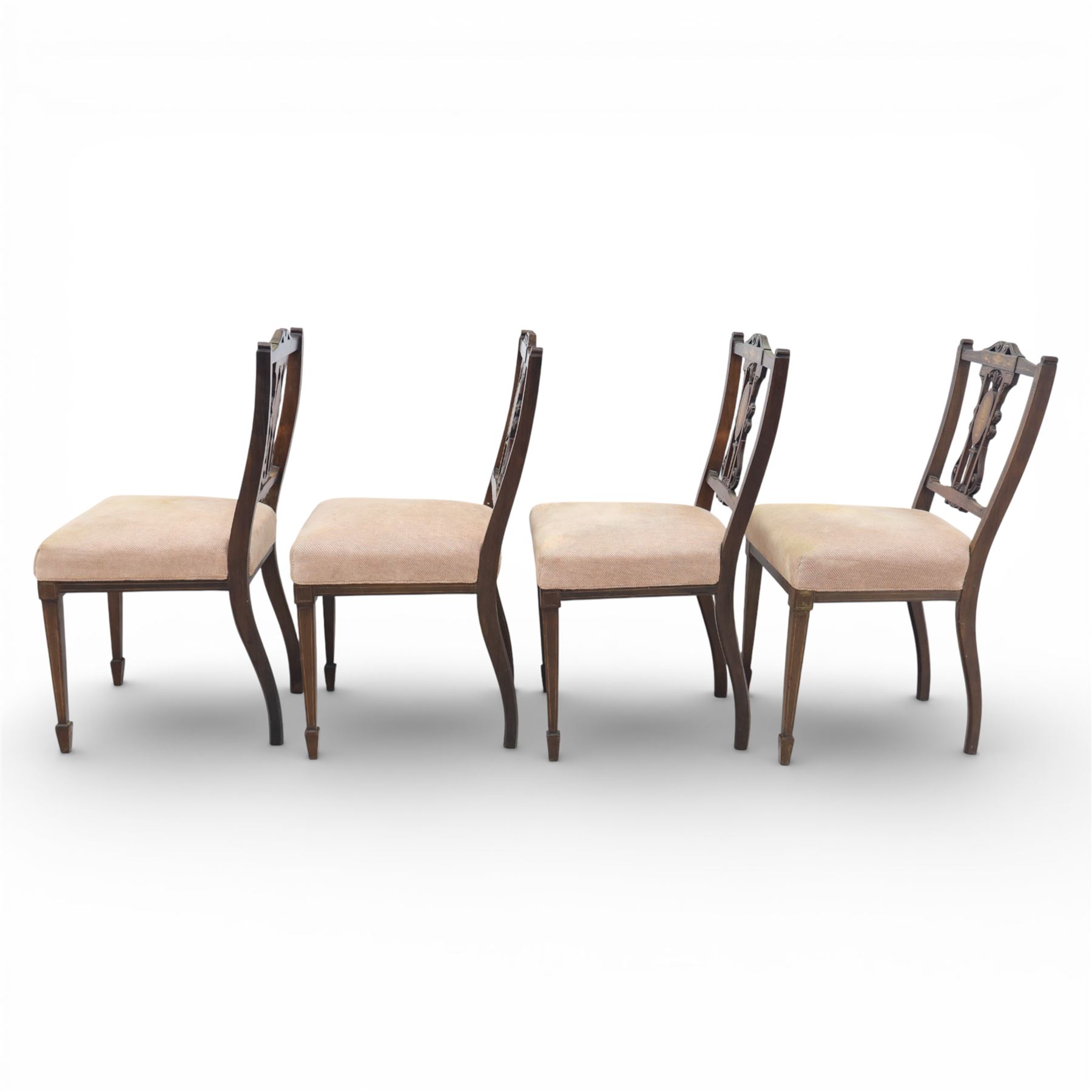 Quality Edwardian seven piece inlaid salon suite, comprising three seater settee, pair of arm chairs and four chairs with pierced splat backs, upholstered in pale pink fabric, inlaid with flowering urns, upon tapering legs with spade feet and castors