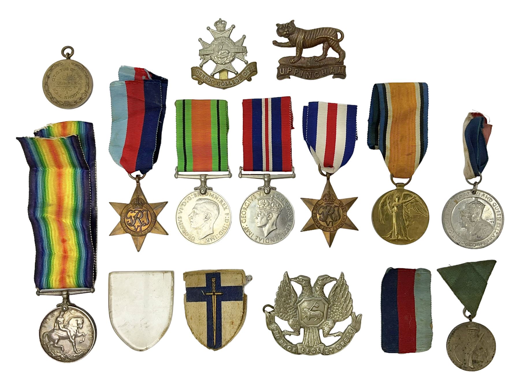 WW1 pair of medals awarded to 151761 Gnr. S. Loten R.A. with ribbons; four WW2 medals with ribbons; and small quantity of cap badges, medallions etc