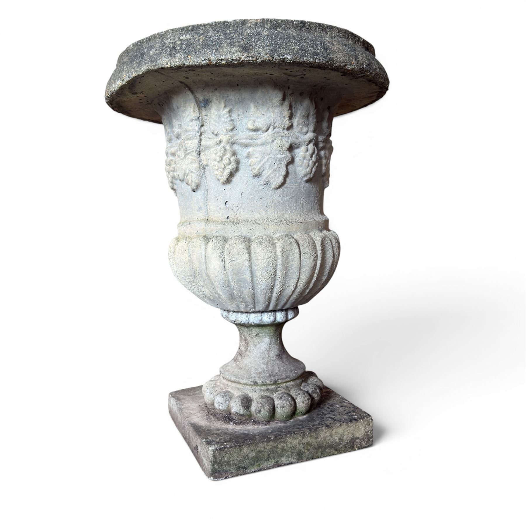 Cast stone classic garden urn, raised on squat pedestal and an ornate cast stone urn (2)