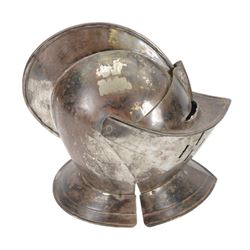Reproduction 17th century European close helmet, the visor with elongated sights, two-piece skull with a high medial roped comb