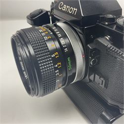 Canon A-1 camera body, serial no. 341014, with 'Canon FD 50mm 1:1.4 S.S.C.' lens, serial no. 12077119 and motor drive MA
