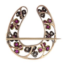 Victorian silver and gold horseshoe brooch set with rose cut diamonds and rubies