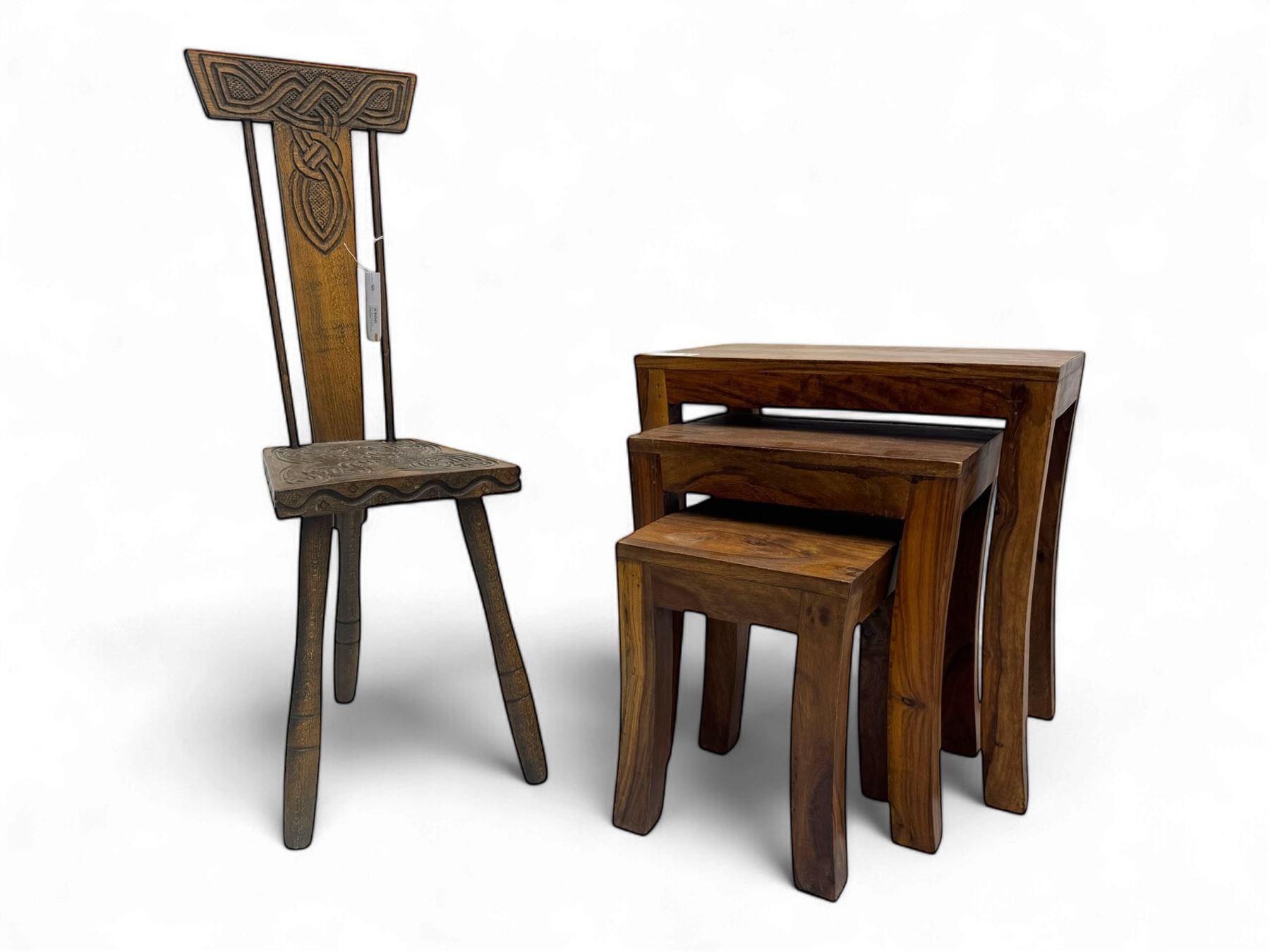 Early 20th century Celtic-design carved oak hall chair, decorated with carved interlacing knot motifs, raised on three splayed supports (W24cm, D26cm, H79cm); nest of three hardwood tables, rectangular tops raised on curved and splayed supports (W45cm, D30cm, H46cm) 