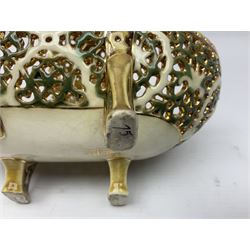 Hungarian Zsolnay Pecs gilt and green reticulated basket, upon four feet, with gold mark beneath, H14cm L21cm