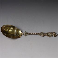 Late Victorian apostle topped sifting spoon, the finial depicting St Christopher, with entwined serpent handle and pierced gilt bowl, hallmarked Mappin & Webb, London 1890, in fitted retailers box for Catchpole and Williams Ltd