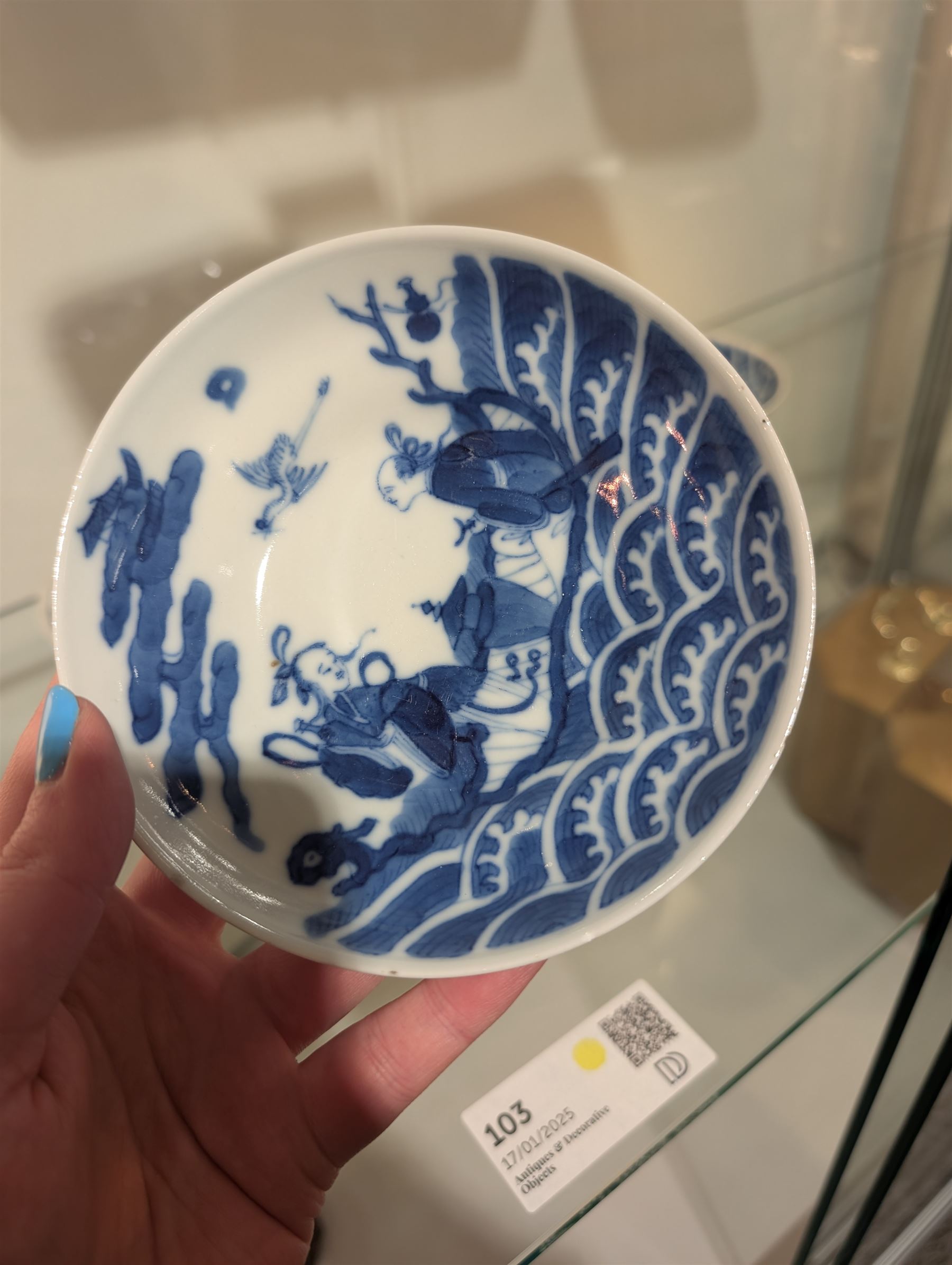 Pair of Chinese blue and white tea bowls, one with cover and four saucers, depicting two figures on a boat at sea, tea bowl H7cm