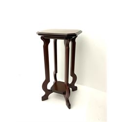 Late 20th mahogany two tier plant stand, shaped supports joined by under tier 