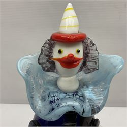 Murano glass clown, together with two glass penguin paperweights, clown H28cm