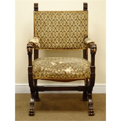  19th century walnut 'X' framed open armchair, lions head carved finials and arms, on paw feet joined by a stretcher  