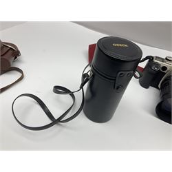 Canon EOS 50e camera body, serial no 8305671 with 'Canon Zoom EF 35-135mm 1:4-5.6' lens together with Halina 35X super camera body, with 'Halina Anastigmat f.c. 1:3.5 f=45mm' lens and other camera equipment 