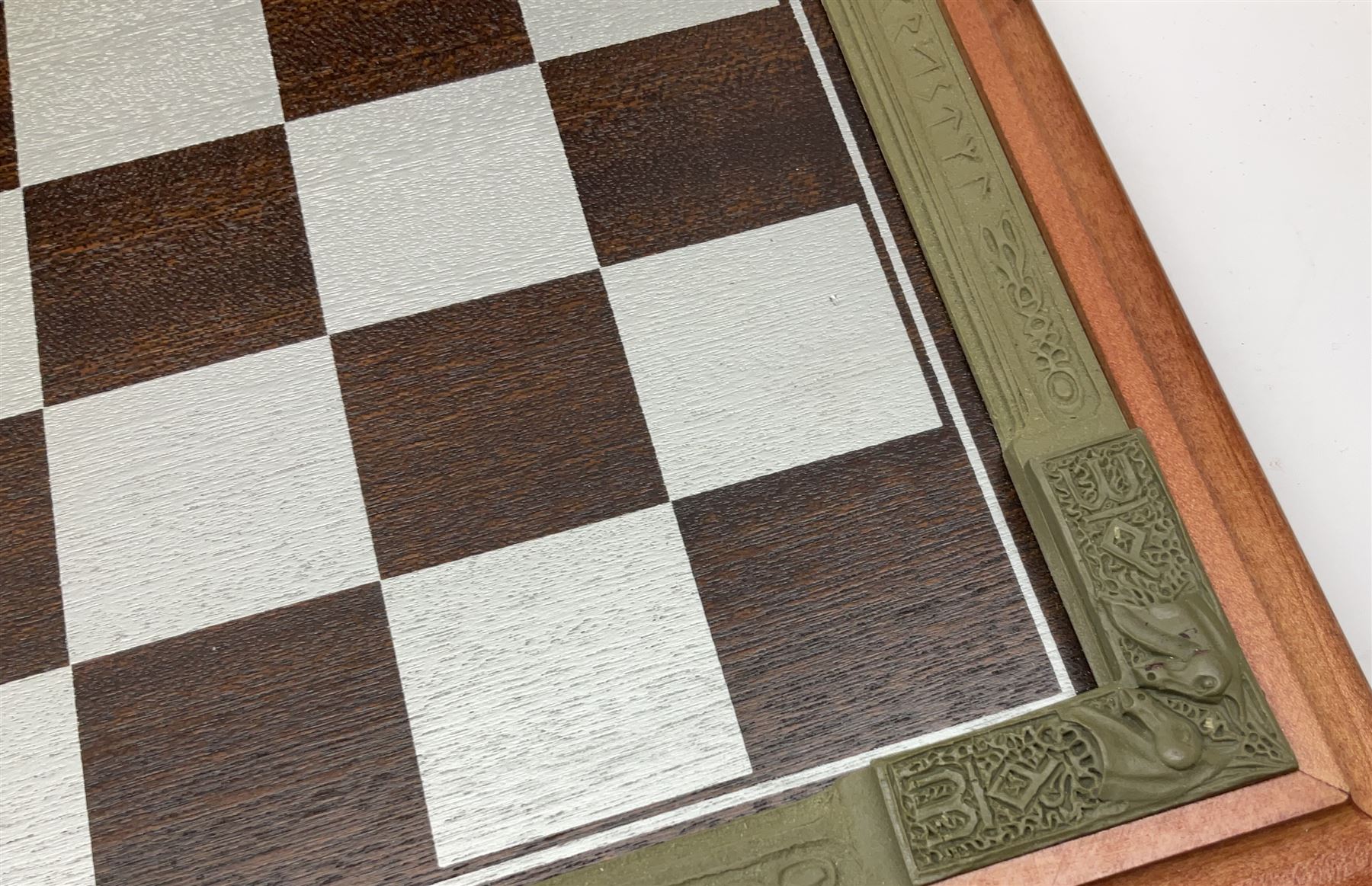 Danbury Mint 'The Fantasy of the Crystal' chess set consisting of mythical pewter chess pieces within a wooden case with chess board lid, together with 16 additional chess pieces in a wooden display case.