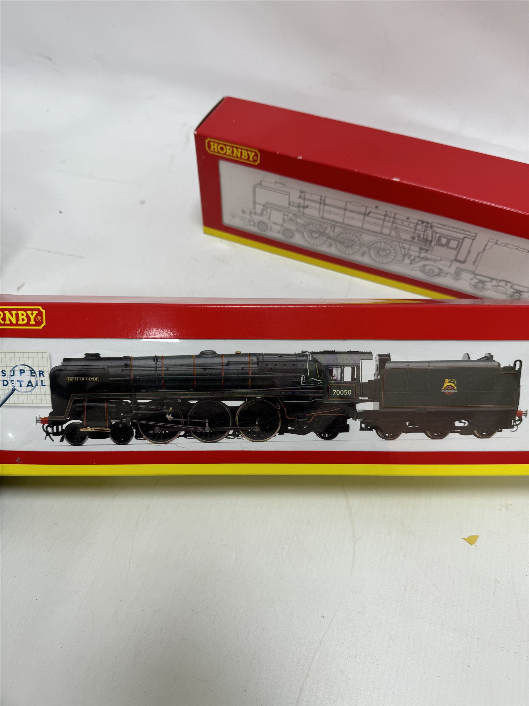 Two Hornby '00' gauge locomotives, comprising R2718 BR Britannia Class 4-6-2 Firth of Clyde locomotive no. 70050 and R2175 BR Britannia Class 4-6-2 re-worked as Dornoch Firth locomotive no. 70054, both boxed
