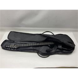 Encore black electric cut-away guitar L96cm; and Spanish Victor Garcia model 187 acoustic guitar, bears label dated 1972 L99cm; each in soft carrying case (2)