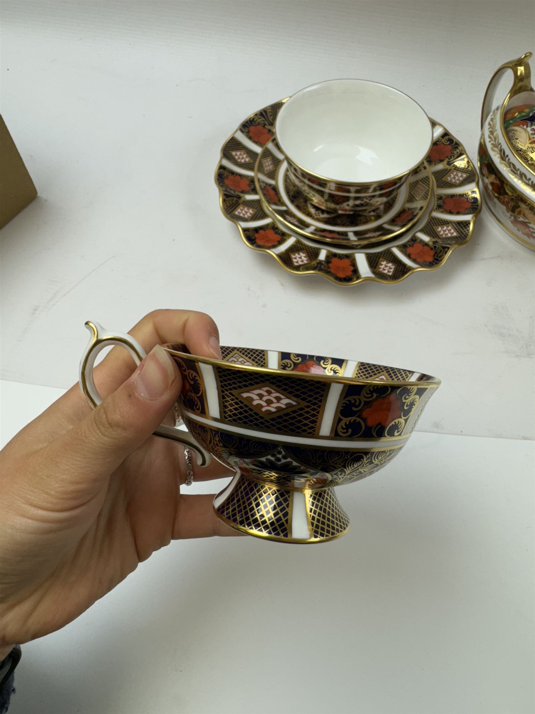 Royal Crown Derby 1128 Old Imari pattern, teacup and saucer, plate with fluted edge and open sucrier, together with spode twin handled sucrier